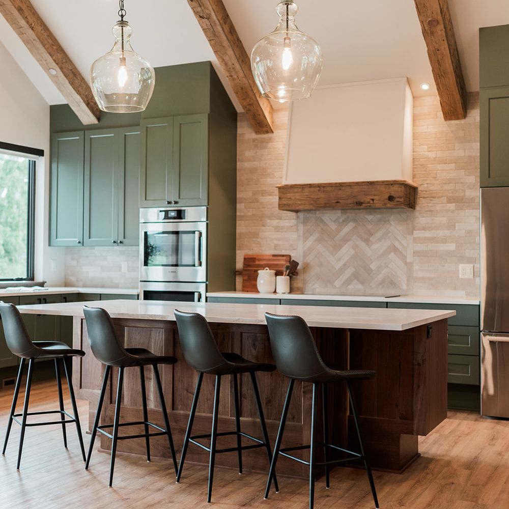 Christensen Construction modern kitchen renovation in Madison, WI featuring custom cabinetry and quartz countertops
